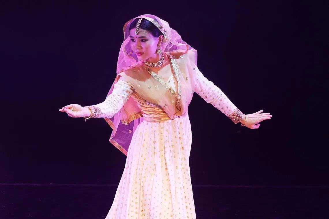 Legal counsel Zoe Tan, adorned in traditional wear, engages in Kathak, a classical Indian dance.