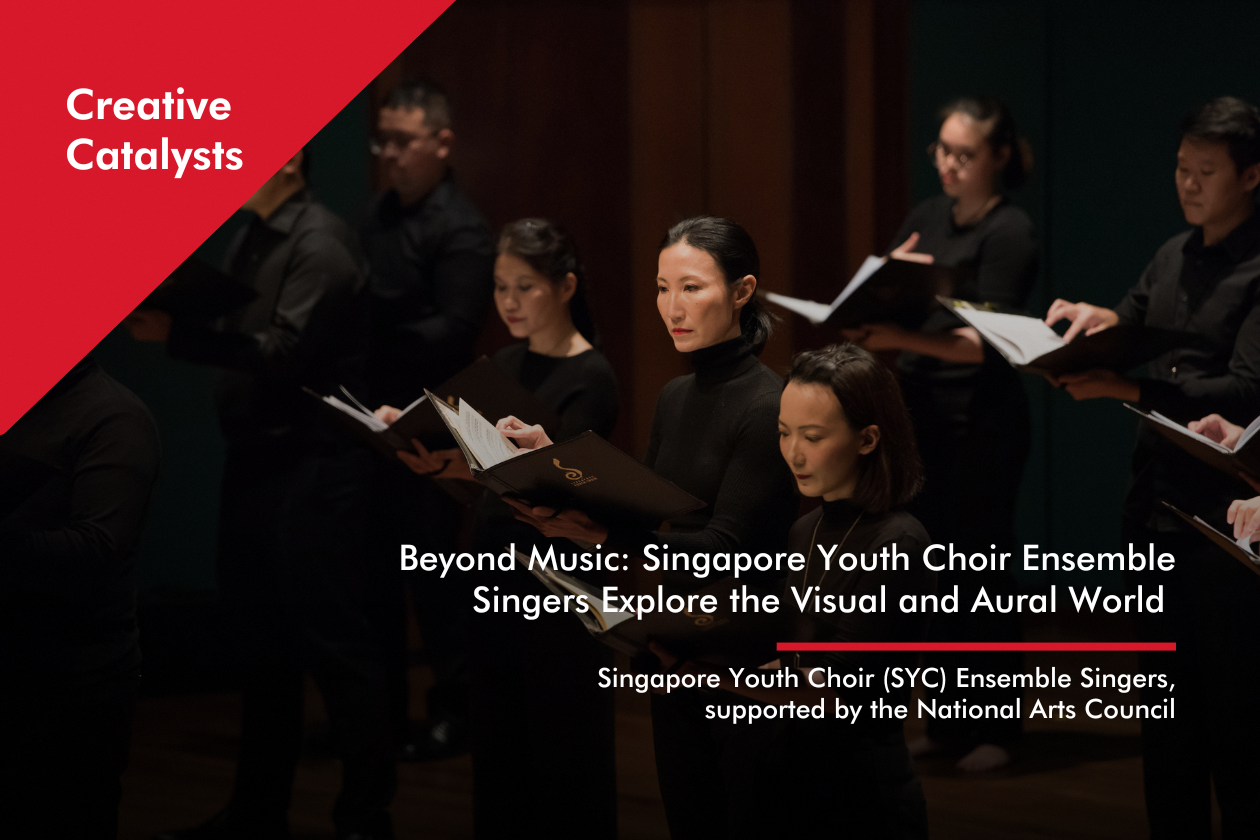 SYC Ensemble Singers-1260x840px-Banner Multiple singers gathered together in formal all-black attire singing