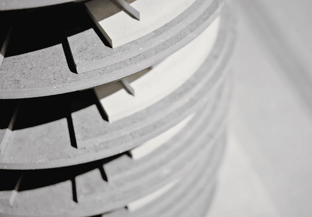 A close-up of ‘Strata’ and the staggered manner in which its concrete discs were laid Close-up of the sculpture and its staggered discs. Each layer look like a short and mini stairway