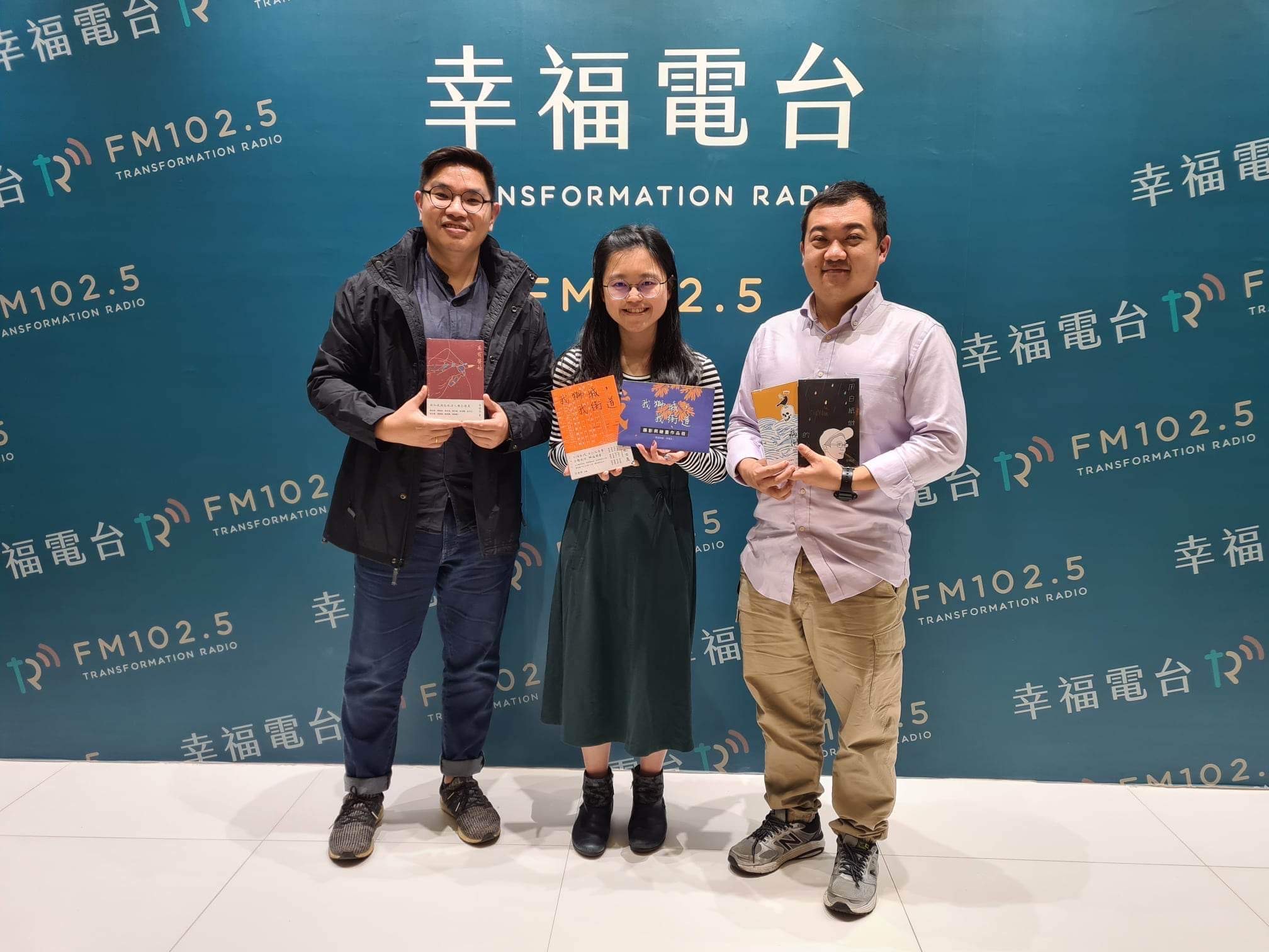 Jin Yong (first from right) and Andy Ang, co-founders of TrendLit Publishing after a radio interview with Transformation Radio 102.5. Image Credit: TrendLit Publishing